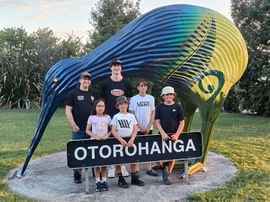 Club members in front of the Giant Kiwi at Otorohanga
